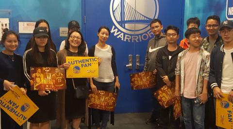 Ningbo City College teachers and students getting a private tour of the Golden State Warriors locker room